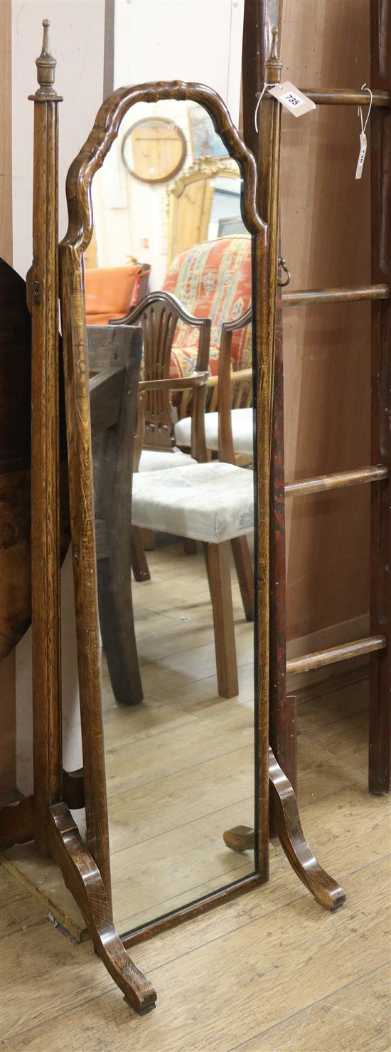 An oak cheval mirror W.40cm